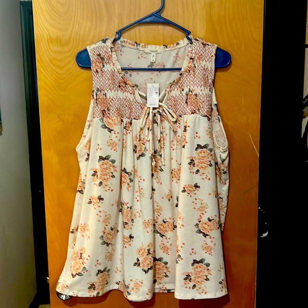 Maurice’s flower tank top.